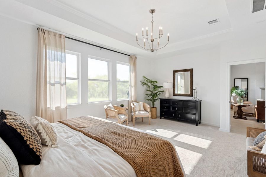 Tranquil primary suite with feature wall (*Photo not of actual home and used for illustration purposes only.)