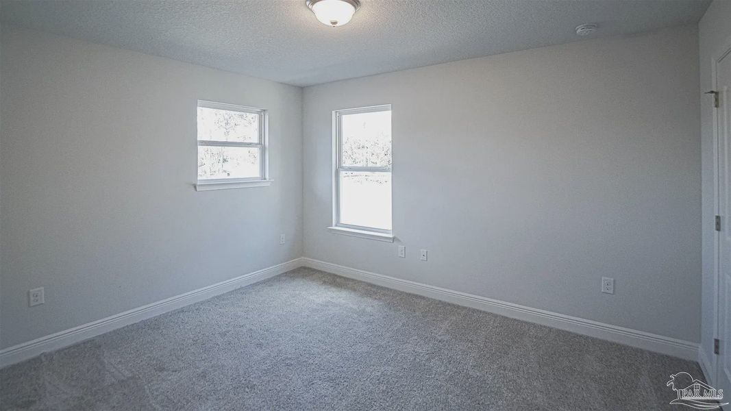 Spacious, unfurnished interior of a new home in Pine Top, Cantonment (Image 16).