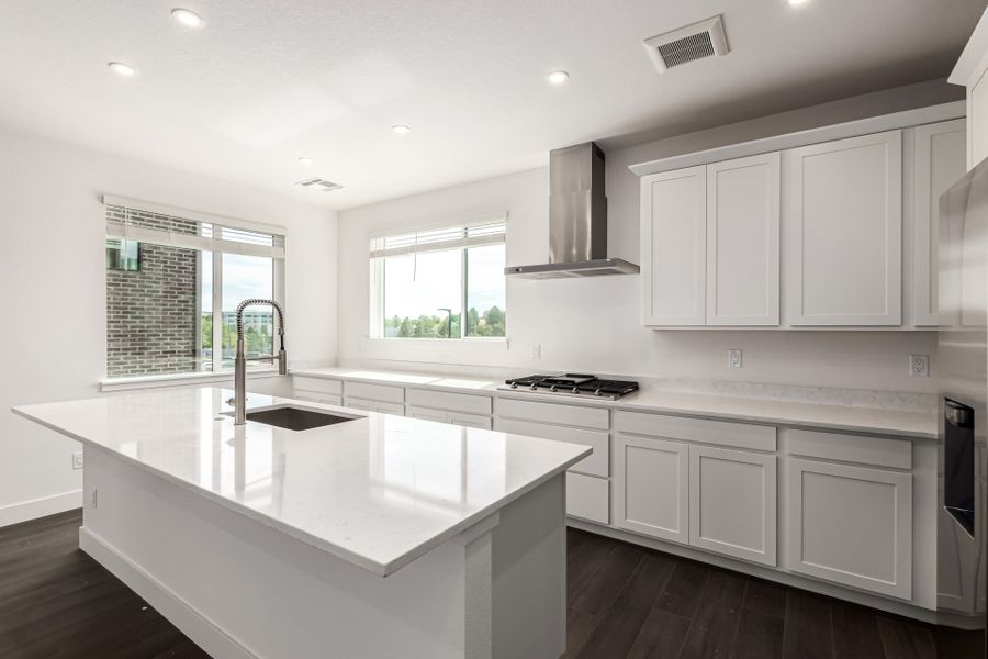Furnished interior view inside a new home in Ascent at Inverness, Englewood (Image 5).