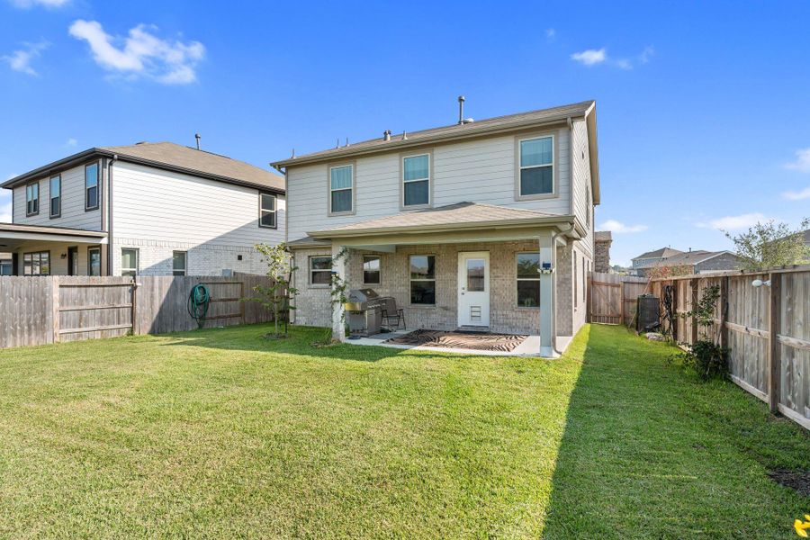 Exterior details and patio area of a home in , Houston (Image 4).