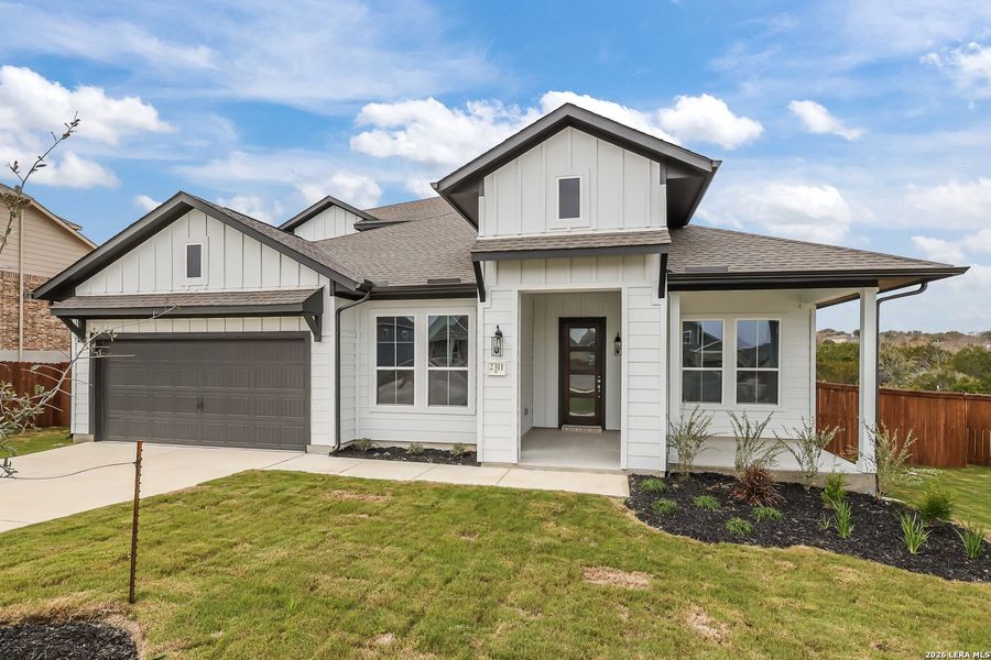 Front exterior of a new home in Homestead, Schertz, TX, highlighting curb appeal (Image 1). Front exterior of a new home in Homestead, Schertz, TX, highlighting curb appeal (Image 1).