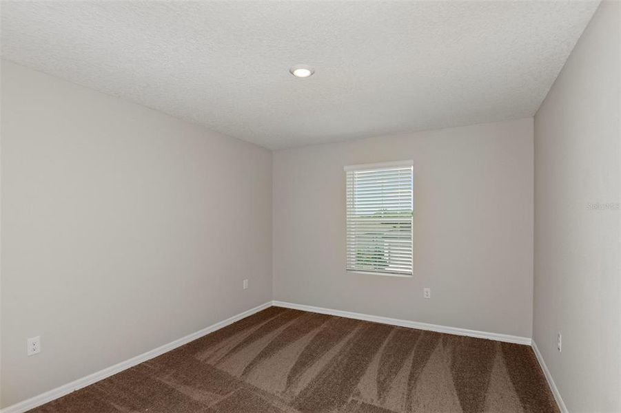 Spacious, unfurnished interior of a new home in Crosswinds, Haines City (Image 18).