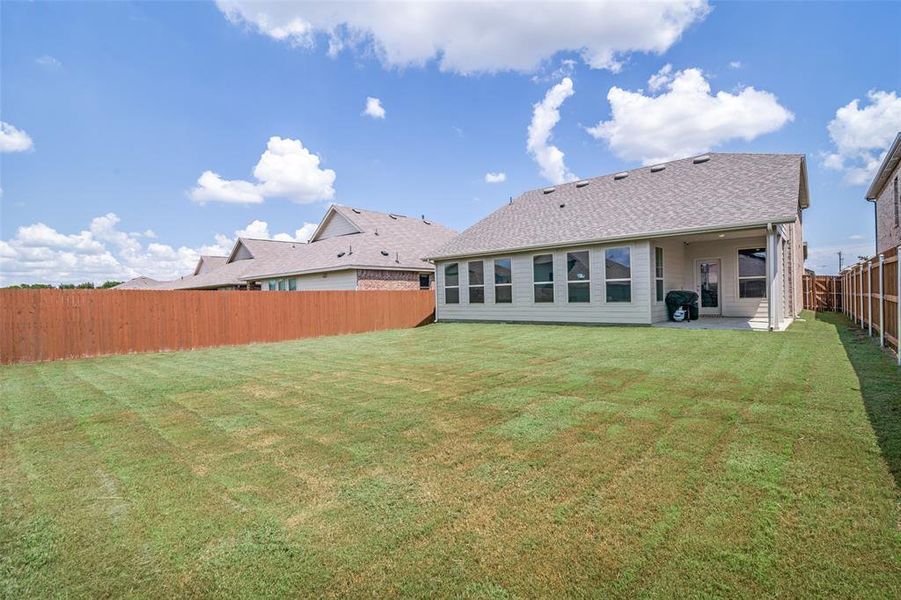 Front exterior of a new home in Heartland, Heartland, TX, highlighting curb appeal (Image 18). Front exterior of a new home in Heartland, Heartland, TX, highlighting curb appeal (Image 18).