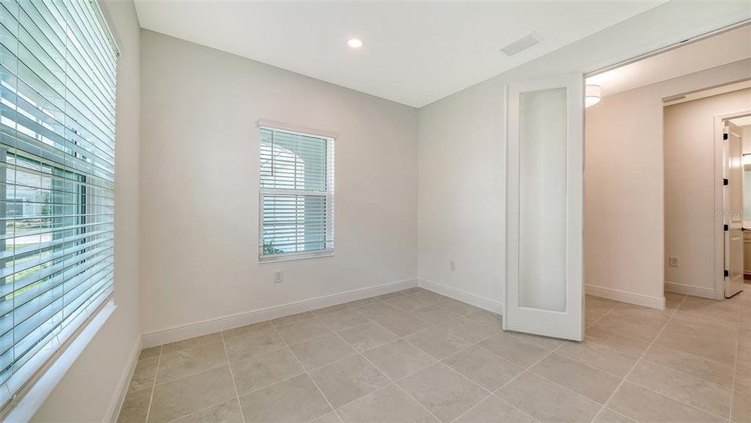 Spacious, unfurnished interior of a new home in Windward Real Estate and Homes for Sale in Sarasota, FL - Neal Communities, Lakewood Ranch (Image 27).
