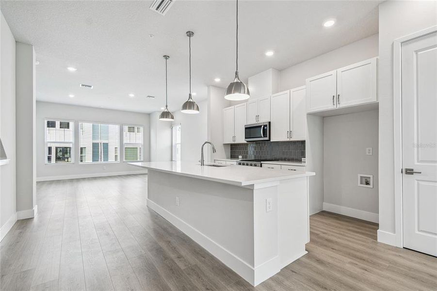 Furnished interior view inside a new home in Apex at Seminole Heights, Tampa (Image 12). Furnished interior view inside a new home in Apex at Seminole Heights, Tampa (Image 12).