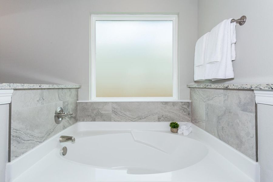 Representative furnished interior of a home built from the The Turquoise by Herbst Homes in Clear Water Landing, Milton (Image 66).