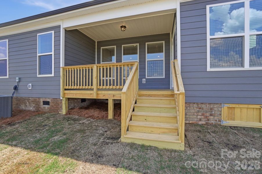 Exterior details and patio area of a home in Waterford Commons, Rock Hill (Image 29).