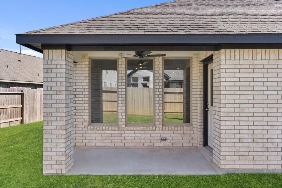 Exterior details and patio area of a home in The Trails 40', New Caney (Image 4).