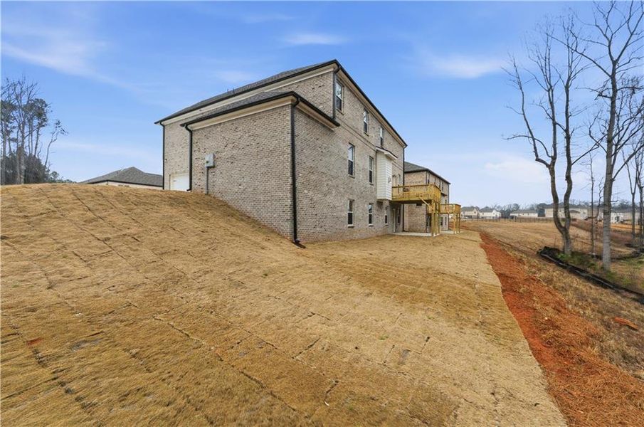 Exterior details and patio area of a home in Trinity Park, McDonough (Image 3).