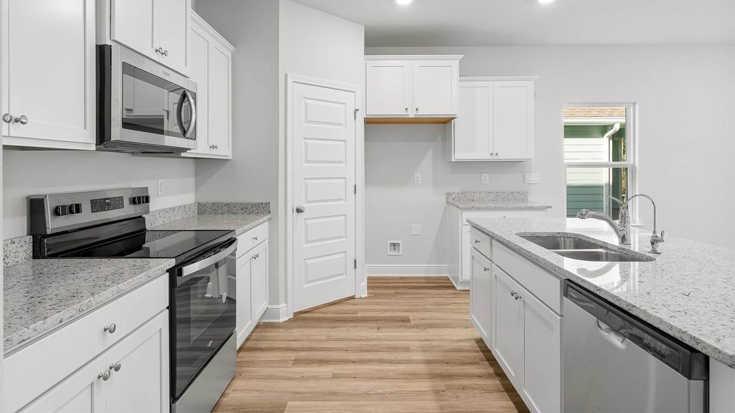 Furnished interior view inside a new home in Pine Creek and Heron Walk, Port Saint Joe (Image 8). Furnished interior view inside a new home in Pine Creek and Heron Walk, Port Saint Joe (Image 8).