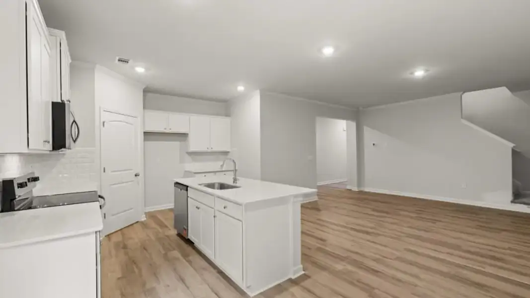 Furnished interior view inside a new home in Waypoint, Flowery Branch (Image 4).