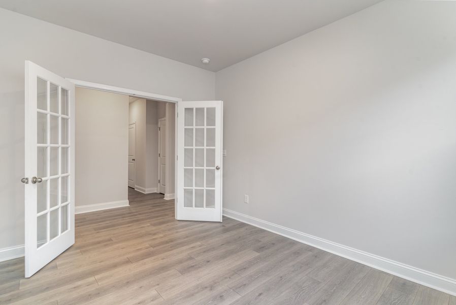 Representative unfurnished interior of a home built from the DARBY by D.R. Horton in Brunswick Plantation, Calabash (Image 9).