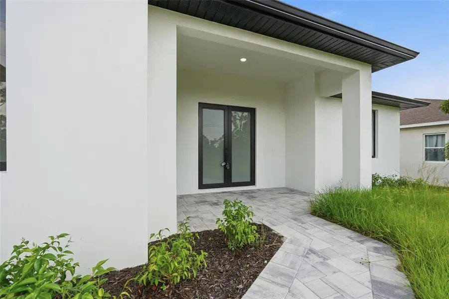 Exterior details and patio area of a home in , Port Charlotte (Image 3). Exterior details and patio area of a home in , Port Charlotte (Image 3).