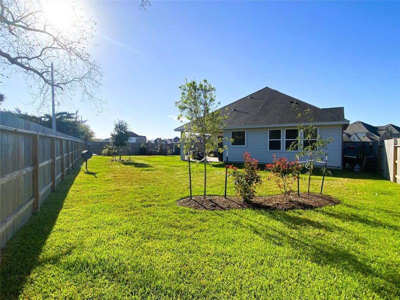 Exterior details and patio area of a home in Centennial Oaks, Santa Fe (Image 20).