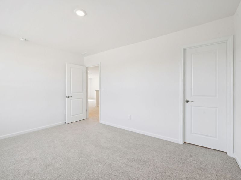 Spacious, unfurnished interior of a new home in Watkins Glen, Raleigh (Image 19).