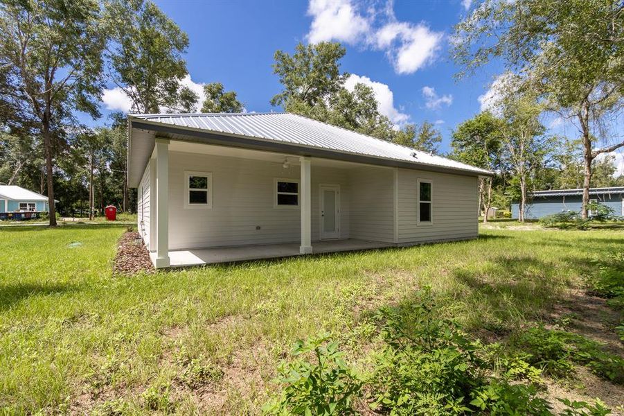 Front exterior of a new home in , Trenton, FL, highlighting curb appeal (Image 1).