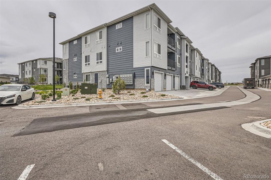 Front exterior of a new home in Stonegate Townhomes, Parker, CO, highlighting curb appeal (Image 2).