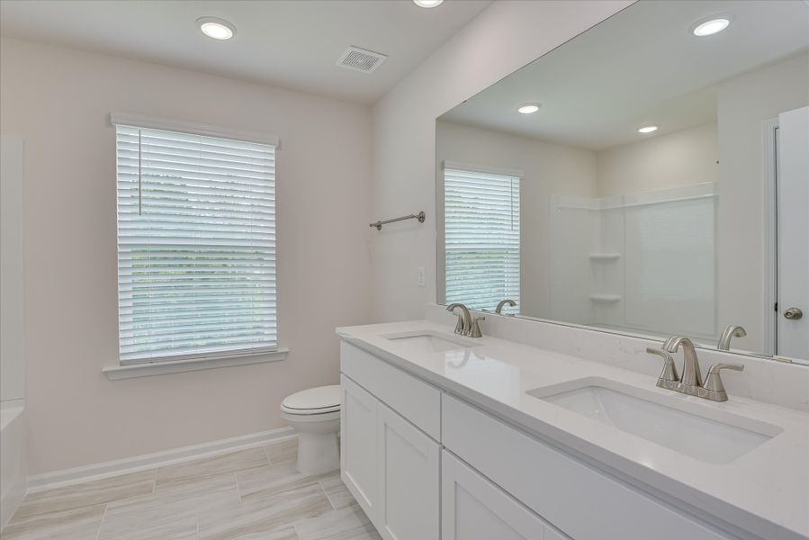 Representative furnished interior of a home built from the Insha by Veranda Homes in Heritage Bay, Sumter (Image 29).