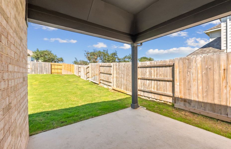 Exterior details and patio area of a home in Crescent Bluff, Georgetown (Image 22).