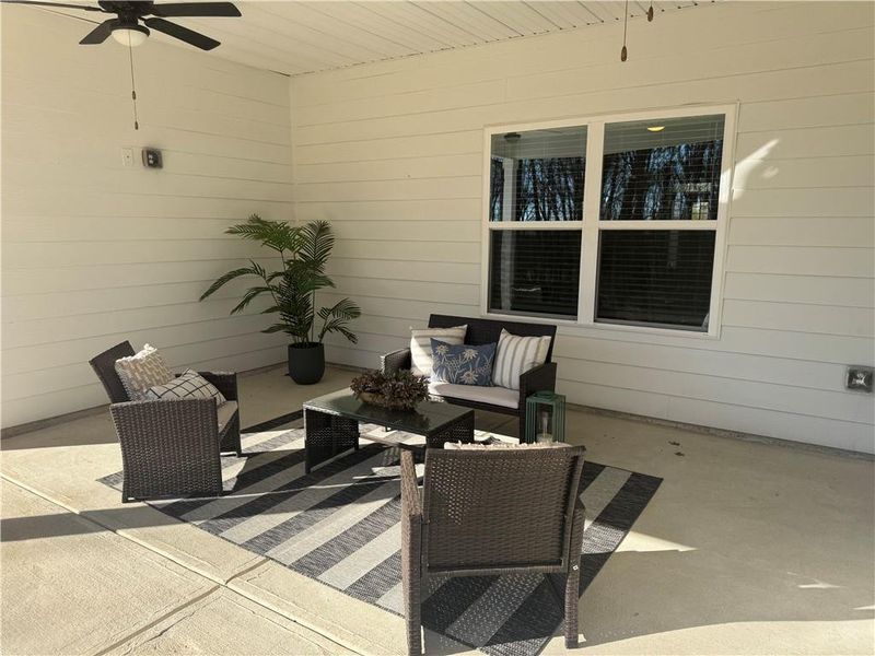 Exterior details and patio area of a home in The Fields of Walnut Creek, Pendergrass (Image 3).