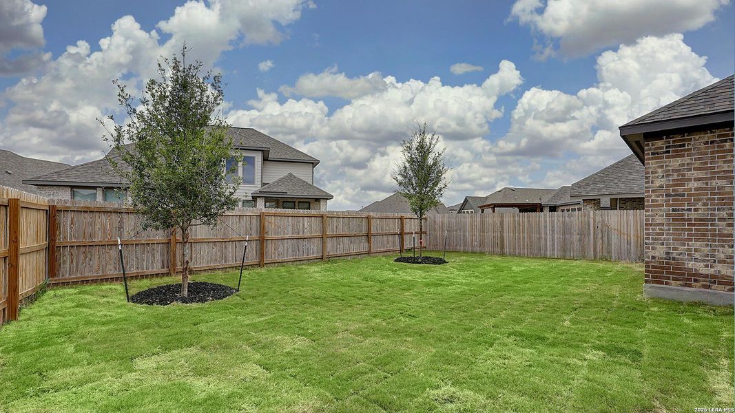 Exterior details and patio area of a home in Alsatian Oaks, Castroville (Image 3).