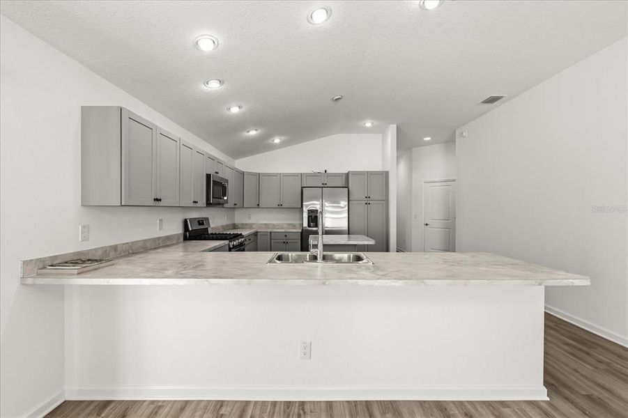 Furnished interior view inside a new home in , The Villages (Image 9).
