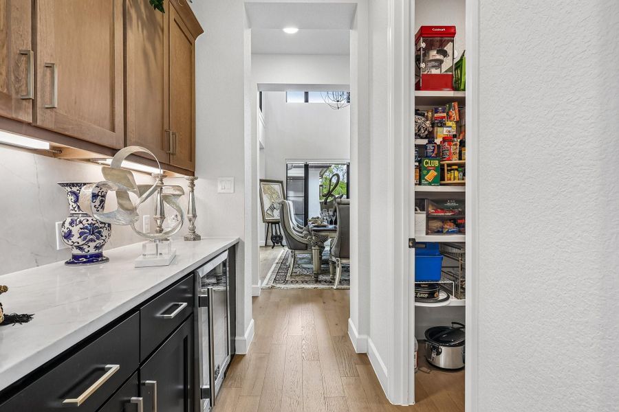 Walk-in pantry and a built-in 40-bottle wine refrigerator.