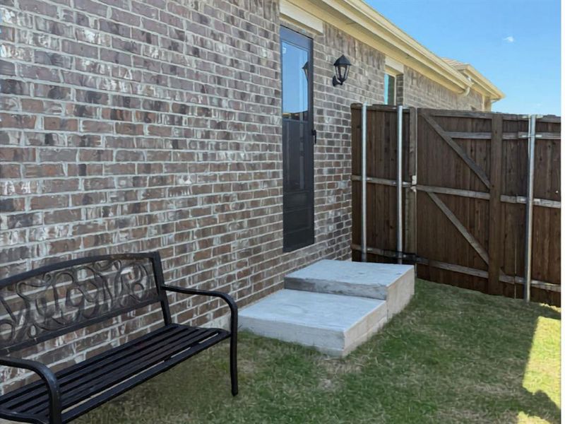 Exterior details and patio area of a home in , Crandall (Image 26).
