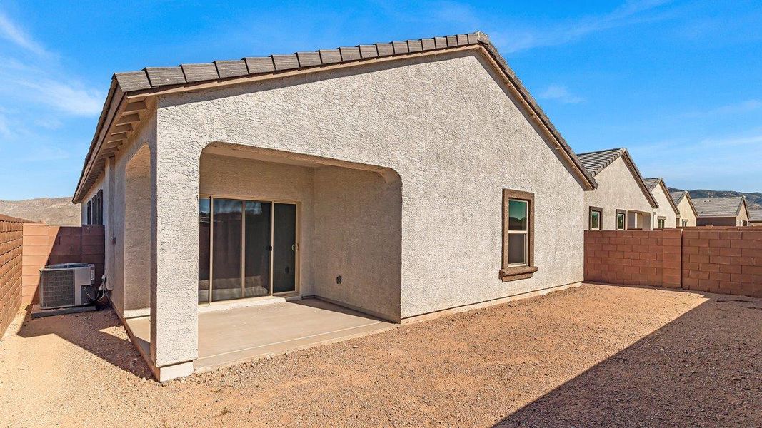 Representative exterior photo of a completed home built from the Parker by D.R. Horton in The Oasis at Rocking K, Vail, AZ (Image 22).