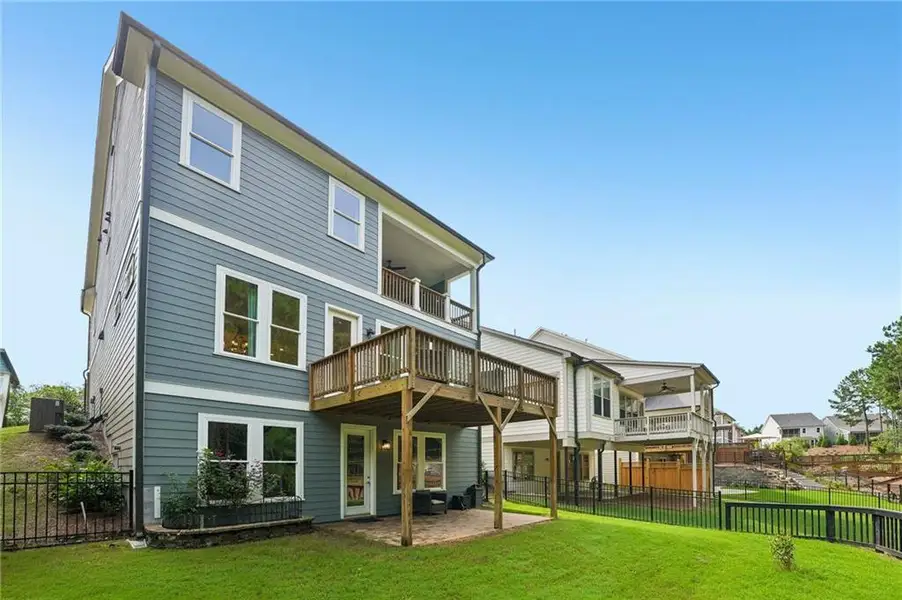 Exterior details and patio area of a home in Lakeside at River Green, Canton (Image 33).