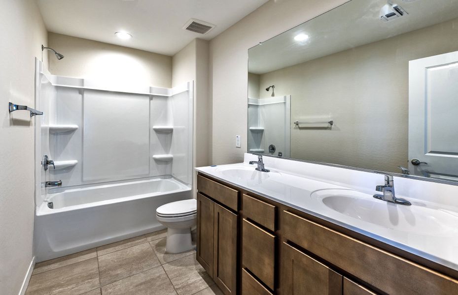 Furnished interior view inside a new home in El Rancho Santa Rosa, Maricopa (Image 6).