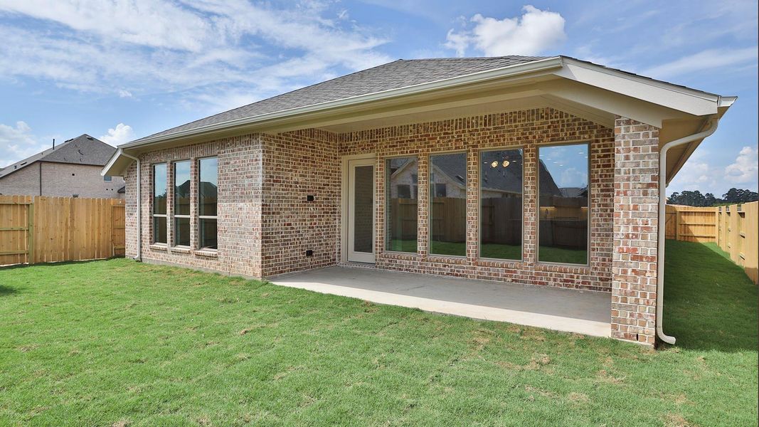 Exterior details and patio area of a home in Artavia, Conroe (Image 3). Exterior details and patio area of a home in Artavia, Conroe (Image 3).