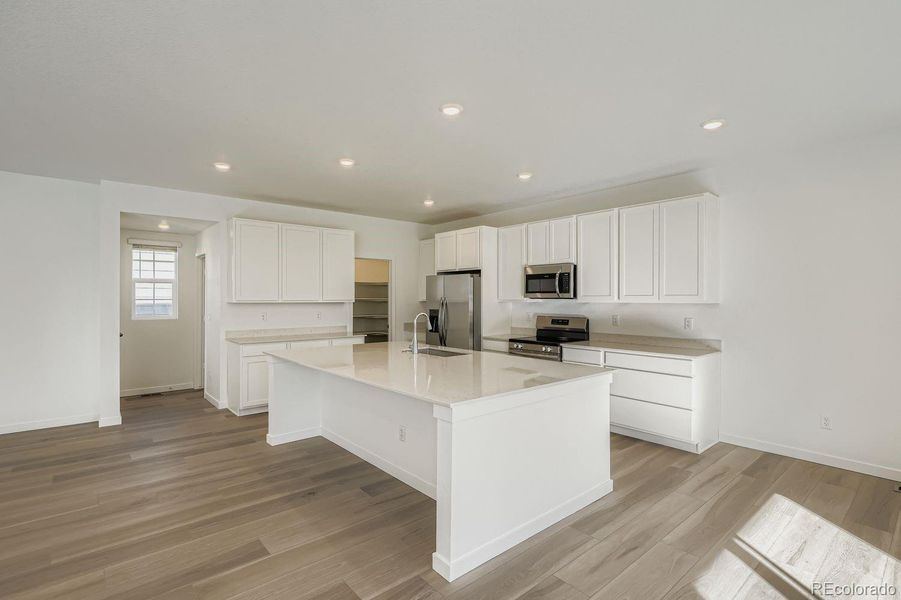 Furnished interior view inside a new home in Parterre: The Skyline Collection, Thornton (Image 8).
