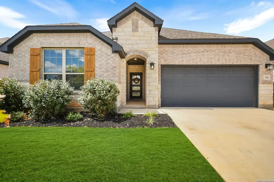 Front exterior of a new home in Corley Farms, Boerne, TX, highlighting curb appeal (Image 1). Front exterior of a new home in Corley Farms, Boerne, TX, highlighting curb appeal (Image 1).