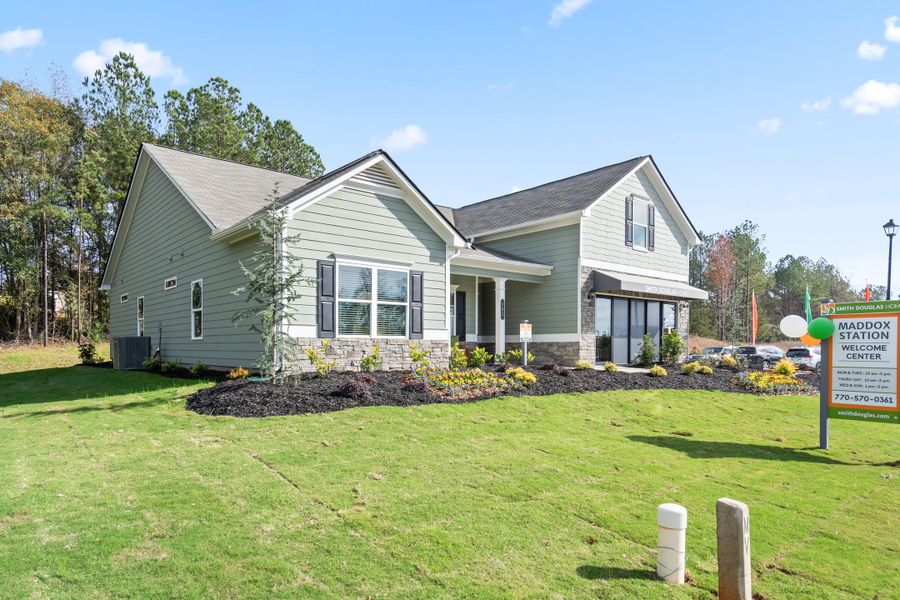 Front exterior of a new home in Maddox Station, Eatonton, GA, highlighting curb appeal (Image 19). Front exterior of a new home in Maddox Station, Eatonton, GA, highlighting curb appeal (Image 19).