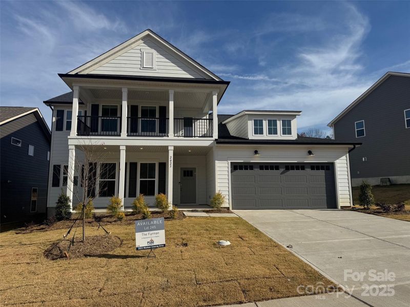 Front exterior of a new home in Forest Creek, Waxhaw, NC, highlighting curb appeal (Image 1).