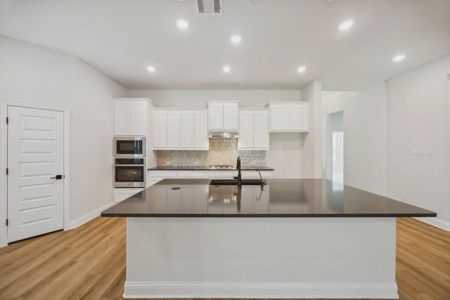 Representative furnished interior of a home built from the Caldwell by Chesmar Homes in Summer Crest, Crowley (Image 4).