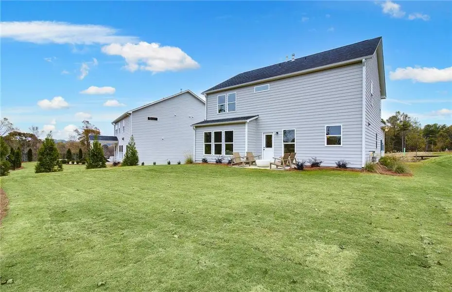 Exterior details and patio area of a home in Hunters Creek, Flowery Branch (Image 3).