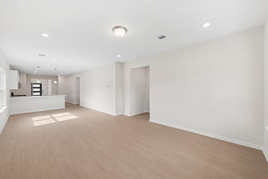 The Cardinal II- Family Room. Photos of home shown are for illustration only; actual features, colors, and upgrades may vary.