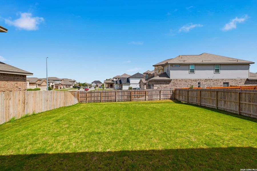 Exterior details and patio area of a home in Horizon Pointe, Converse (Image 4).