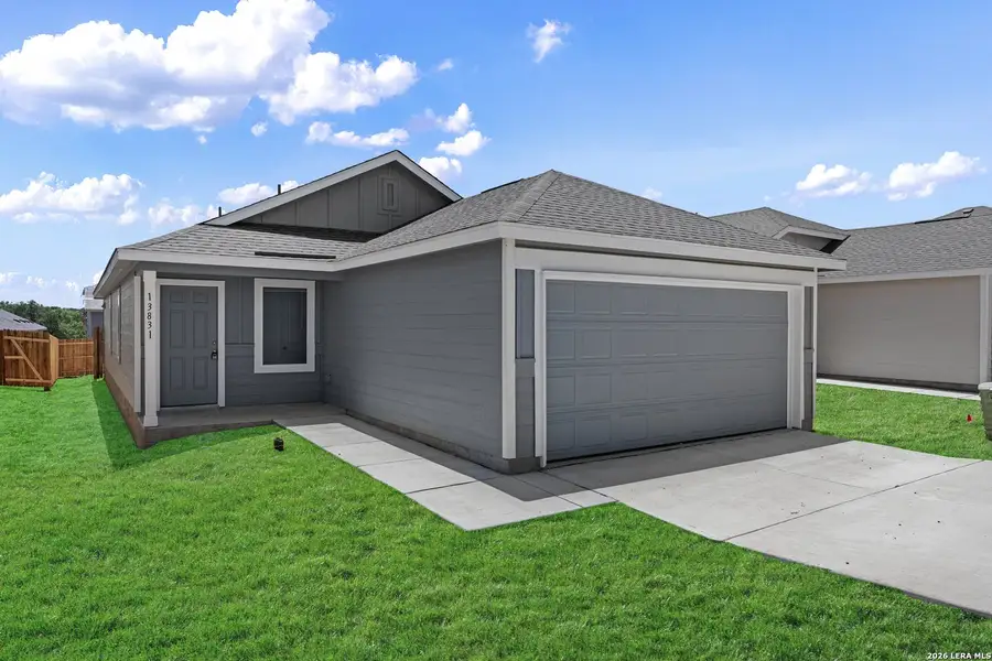 Front exterior of a new home in Hidden Oasis, San Antonio, TX, highlighting curb appeal (Image 1). Front exterior of a new home in Hidden Oasis, San Antonio, TX, highlighting curb appeal (Image 1).