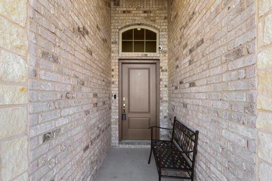 Exterior details and patio area of a home in , Anna (Image 2). Exterior details and patio area of a home in , Anna (Image 2).