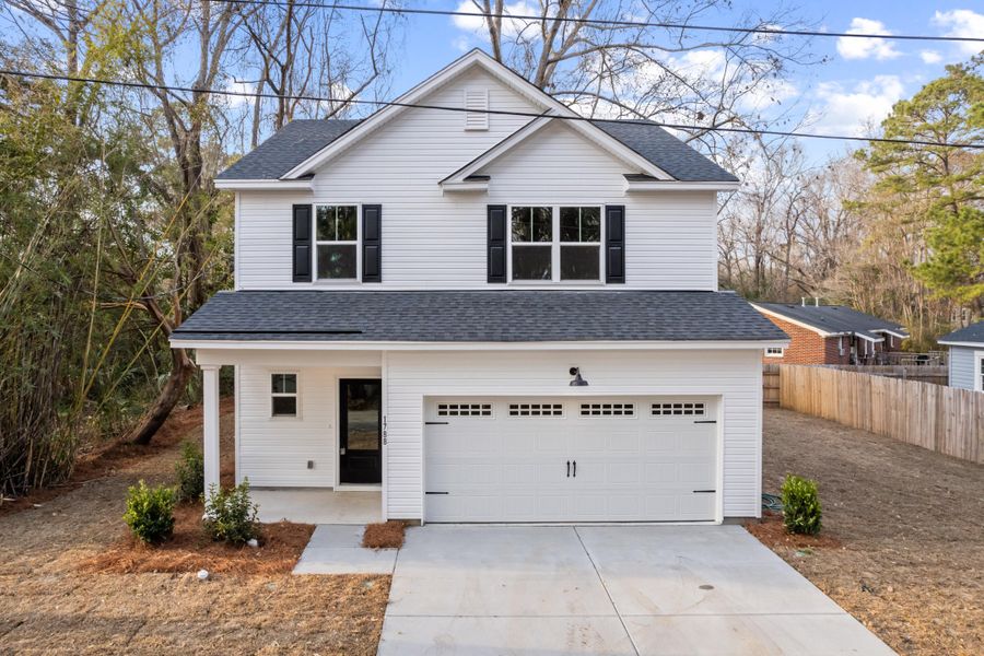 Front exterior of a new home in , Charleston, SC, highlighting curb appeal (Image 24). Front exterior of a new home in , Charleston, SC, highlighting curb appeal (Image 24).