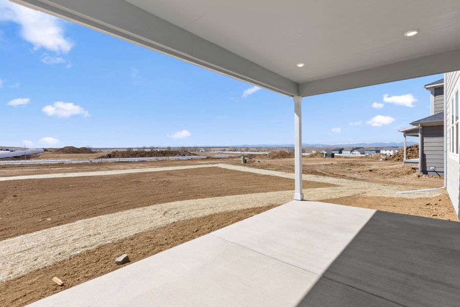 Exterior details and patio area of a home in The Estates Collection at Murphy Creek, Aurora (Image 3).