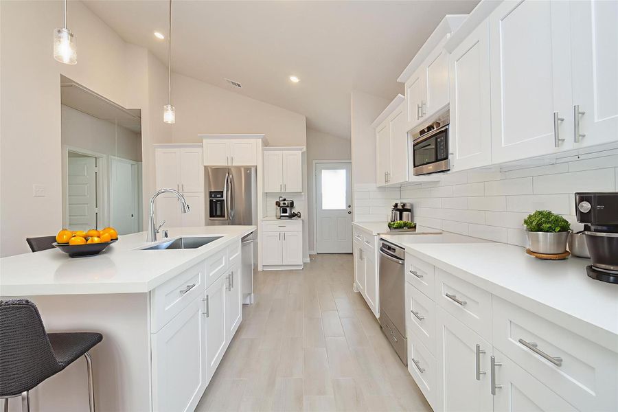 This kitchen is a perfect blend of style and functionality, ready for new memories to be made. This kitchen is a perfect blend of style and functionality, ready for new memories to be made.