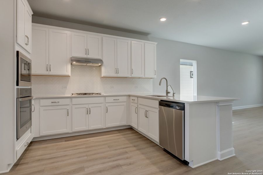 Furnished interior view inside a new home in Enclave at Hennersby Hollow 50's, San Antonio (Image 13). Furnished interior view inside a new home in Enclave at Hennersby Hollow 50's, San Antonio (Image 13).