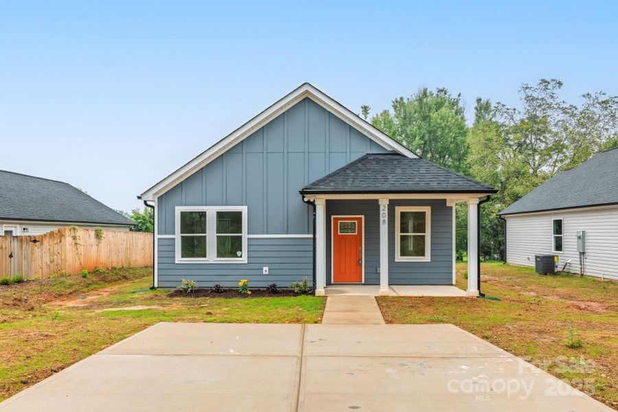 Front exterior of a new home in , East Spencer, NC, highlighting curb appeal (Image 26).
