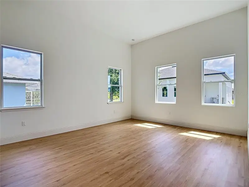 Spacious, unfurnished interior of a new home in , Port Charlotte (Image 31).