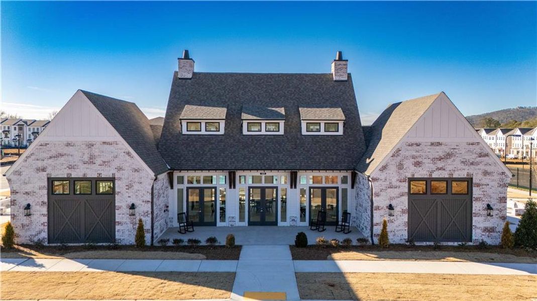 Front exterior of a new home in Promenade at Sawnee Village, Cumming, GA, highlighting curb appeal (Image 20).