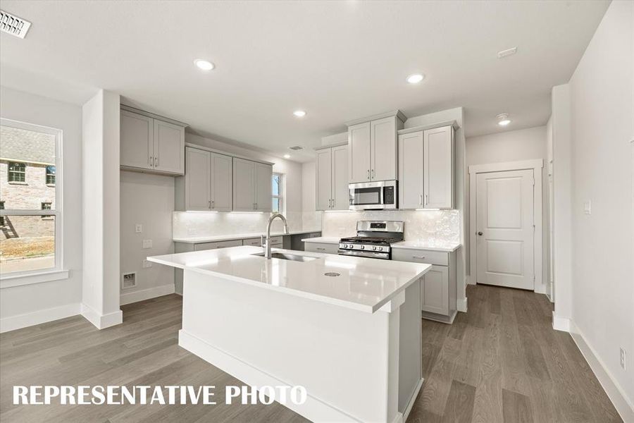 Beautiful cabinetry and finishes in a neutral color palette are waiting for you in this dream home!  REPRESENTATIVE PHOTO